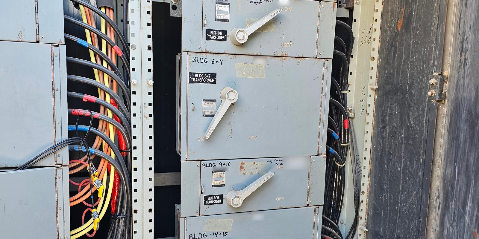 Commercial distribution switchboard with transformer feeders during a load study
