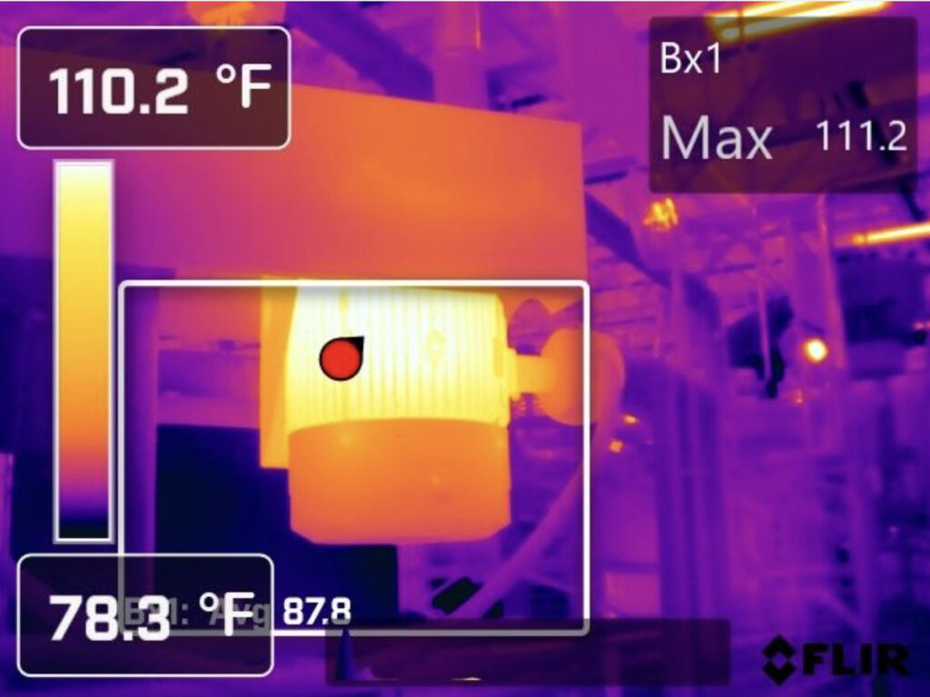 Thermal scan of an electric motor showing surface temperature readings