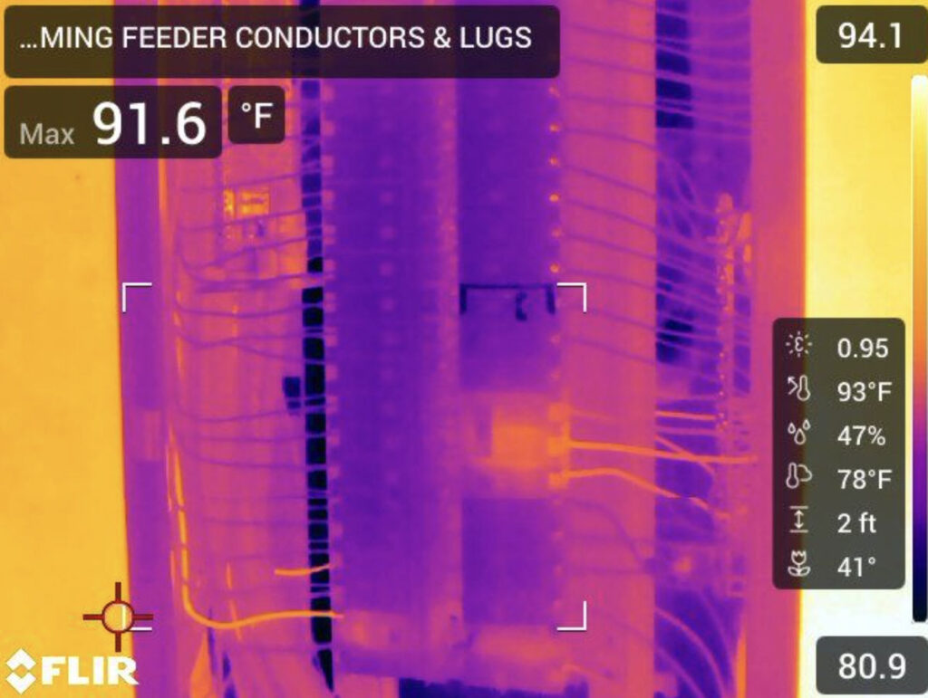 Infrared scan of feeder conductors and lugs inside an electrical panel