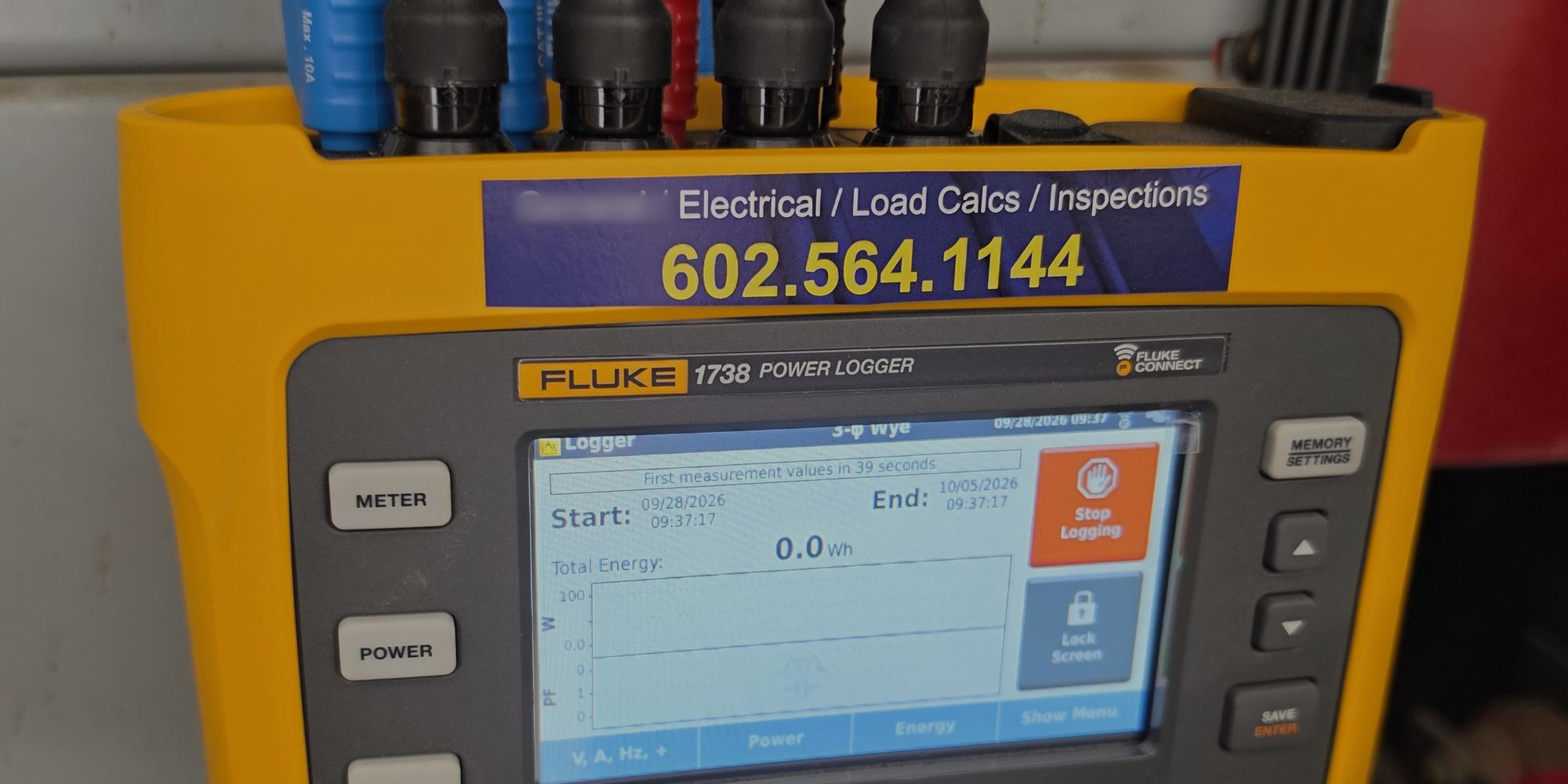 Fluke 1738 power logger connected to three-phase feeders for an electrical load study